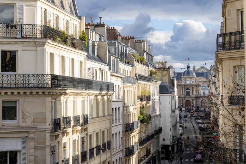 view over the senat and Parisian street from welcome hotel in rue de seine Paris